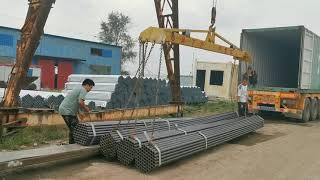 Carregamento do tubo de andaimes